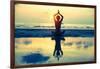 Yoga Woman Sitting In Lotus Pose On The Beach During Sunset-De Visu-Framed Art Print