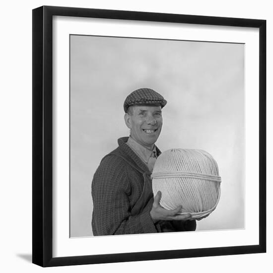 Yorkshireman Wearing a Flat Cap and Holding a Large Ball of Twine, 1968-Michael Walters-Framed Photographic Print