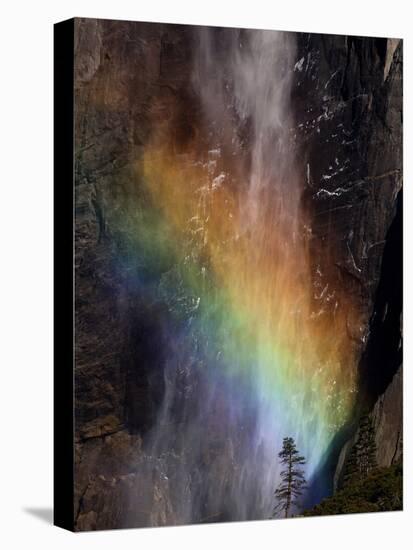 Yosemite National Park, California: Detail of a Rainbow Emerging from the Mist of Yosemite Falls-Ian Shive-Stretched Canvas