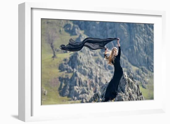 Youn Woman Wearing Black Dress Outdoor on Rocks-geanina bechea-Framed Photographic Print