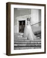 Young Adult Female in Long Wedding Dress Standing on Steps-Steven Boone-Framed Photographic Print