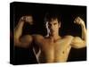 Young Adult Male Posing with Arms Flexed-Chris Trotman-Stretched Canvas