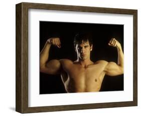 Young Adult Male Posing with Arms Flexed-Chris Trotman-Framed Photographic Print