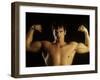 Young Adult Male Posing with Arms Flexed-Chris Trotman-Framed Photographic Print