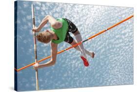Young Athletes Pole Vault Seems to Reach the Sky-mezzotint-Stretched Canvas