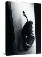 Young Bassist Member of Alexander Schneider's New York String Orchestra Tuning His Instrument-Gjon Mili-Stretched Canvas