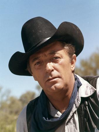 https://imgc.allpostersimages.com/img/posters/young-billy-young-by-burt-kennedy-based-on-a-novel-by-heck-allen-with-robert-mitchum-1969-photo_u-L-Q1C3HHY0.jpg?artPerspective=n