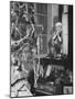 Young Boy Admiring Christmas Tree and Presents from Window-null-Mounted Photo