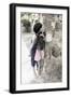 Young Boy and Girl Peeking around a Stone Wall.-Nora Hernandez-Framed Giclee Print