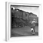 Young Boy and His Dog Standing at the Crossing as a Train Rides Through-Myron Davis-Framed Photographic Print