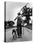 Young Boy and His Dog Walking Home from Fishing-Myron Davis-Stretched Canvas