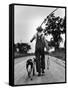 Young Boy and His Dog Walking Home from Fishing-Myron Davis-Framed Stretched Canvas