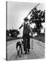 Young Boy and His Dog Walking Home from Fishing-Myron Davis-Stretched Canvas