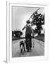 Young Boy and His Dog Walking Home from Fishing-Myron Davis-Framed Photographic Print