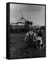 Young Boy and His Dog Watching the Circus Tents Being Set Up-Myron Davis-Framed Stretched Canvas