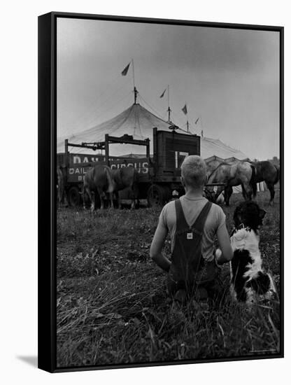 Young Boy and His Dog Watching the Circus Tents Being Set Up-Myron Davis-Framed Stretched Canvas