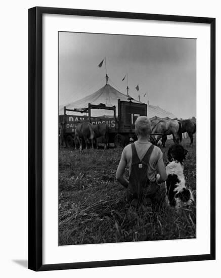 Young Boy and His Dog Watching the Circus Tents Being Set Up-Myron Davis-Framed Photographic Print