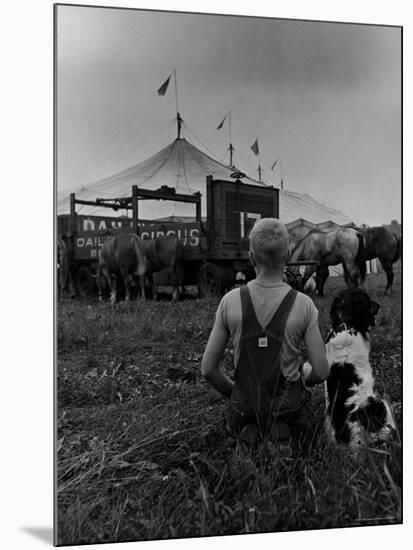 Young Boy and His Dog Watching the Circus Tents Being Set Up-Myron Davis-Mounted Photographic Print