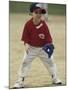 Young Boy at Short Stop During a Tee Ball Game-null-Mounted Photographic Print