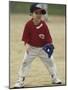 Young Boy at Short Stop During a Tee Ball Game-null-Mounted Photographic Print
