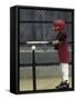 Young Boy Batting During a Tee Ball Game-null-Framed Stretched Canvas