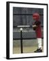 Young Boy Batting During a Tee Ball Game-null-Framed Photographic Print