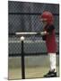 Young Boy Batting During a Tee Ball Game-null-Mounted Photographic Print