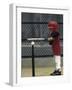 Young Boy Batting During a Tee Ball Game-null-Framed Photographic Print