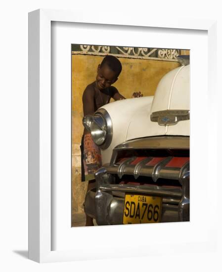 Young Boy Drumming on Old American Car's Bonnet,Trinidad, Sancti Spiritus Province, Cuba-Eitan Simanor-Framed Photographic Print