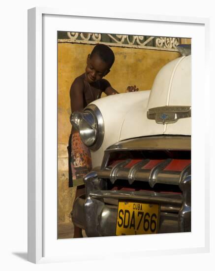 Young Boy Drumming on Old American Car's Bonnet,Trinidad, Sancti Spiritus Province, Cuba-Eitan Simanor-Framed Photographic Print