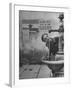 Young Boy Getting a Drink from Fountain in Trieste Region-Nat Farbman-Framed Photographic Print