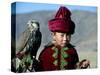 Young Boy Holding a Falcon, Golden Eagle Festival, Mongolia-Amos Nachoum-Stretched Canvas