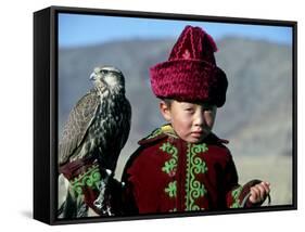 Young Boy Holding a Falcon, Golden Eagle Festival, Mongolia-Amos Nachoum-Framed Stretched Canvas