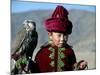 Young Boy Holding a Falcon, Golden Eagle Festival, Mongolia-Amos Nachoum-Mounted Photographic Print