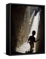 Young Boy in Tower of Castelo de Sao Jorge, Portgual-Merrill Images-Framed Stretched Canvas