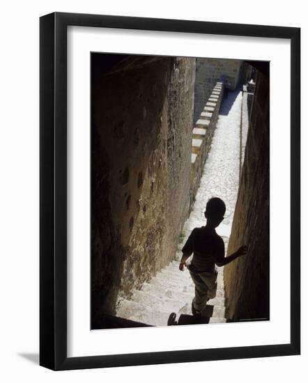 Young Boy in Tower of Castelo de Sao Jorge, Portgual-Merrill Images-Framed Photographic Print