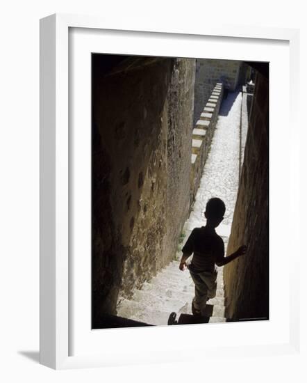 Young Boy in Tower of Castelo de Sao Jorge, Portgual-Merrill Images-Framed Photographic Print