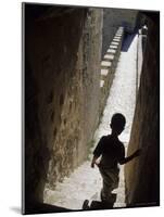 Young Boy in Tower of Castelo de Sao Jorge, Portgual-Merrill Images-Mounted Photographic Print