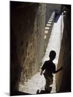 Young Boy in Tower of Castelo de Sao Jorge, Portgual-Merrill Images-Mounted Photographic Print