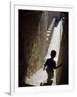 Young Boy in Tower of Castelo de Sao Jorge, Portgual-Merrill Images-Framed Photographic Print