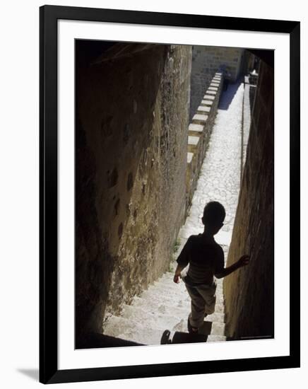 Young Boy in Tower of Castelo de Sao Jorge, Portgual-Merrill Images-Framed Photographic Print