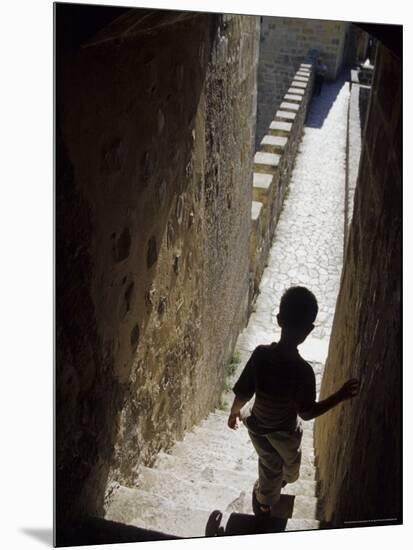 Young Boy in Tower of Castelo de Sao Jorge, Portgual-Merrill Images-Mounted Photographic Print
