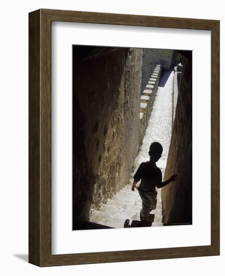 Young Boy in Tower of Castelo de Sao Jorge, Portgual-Merrill Images-Framed Photographic Print