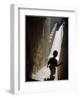 Young Boy in Tower of Castelo de Sao Jorge, Portgual-Merrill Images-Framed Photographic Print