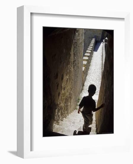 Young Boy in Tower of Castelo de Sao Jorge, Portgual-Merrill Images-Framed Photographic Print