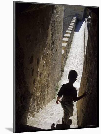 Young Boy in Tower of Castelo de Sao Jorge, Portgual-Merrill Images-Mounted Photographic Print