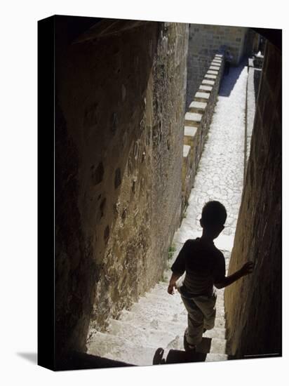 Young Boy in Tower of Castelo de Sao Jorge, Portgual-Merrill Images-Stretched Canvas
