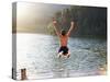 Young Boy Jumping into Lake-Monkey Business Images-Stretched Canvas