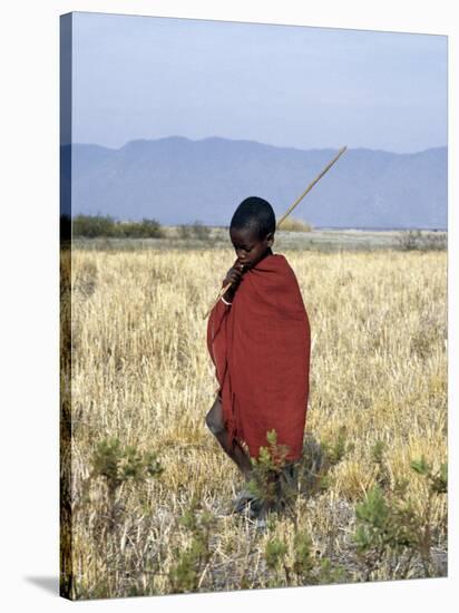 Young Boy of the Datoga Tribe Crosses the Plains East of Lake Manyara in Northern Tanzania-Nigel Pavitt-Stretched Canvas