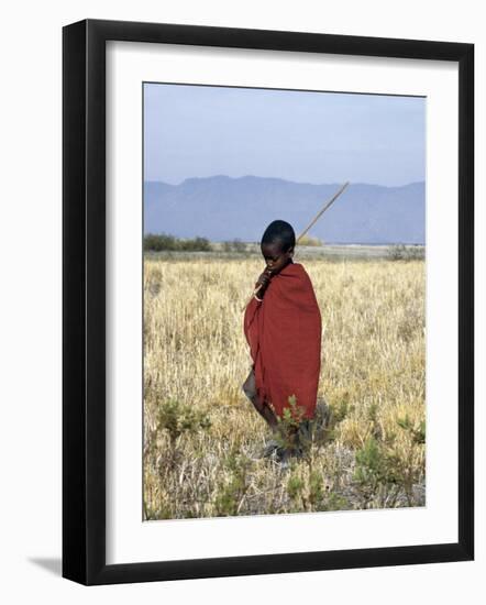 Young Boy of the Datoga Tribe Crosses the Plains East of Lake Manyara in Northern Tanzania-Nigel Pavitt-Framed Photographic Print